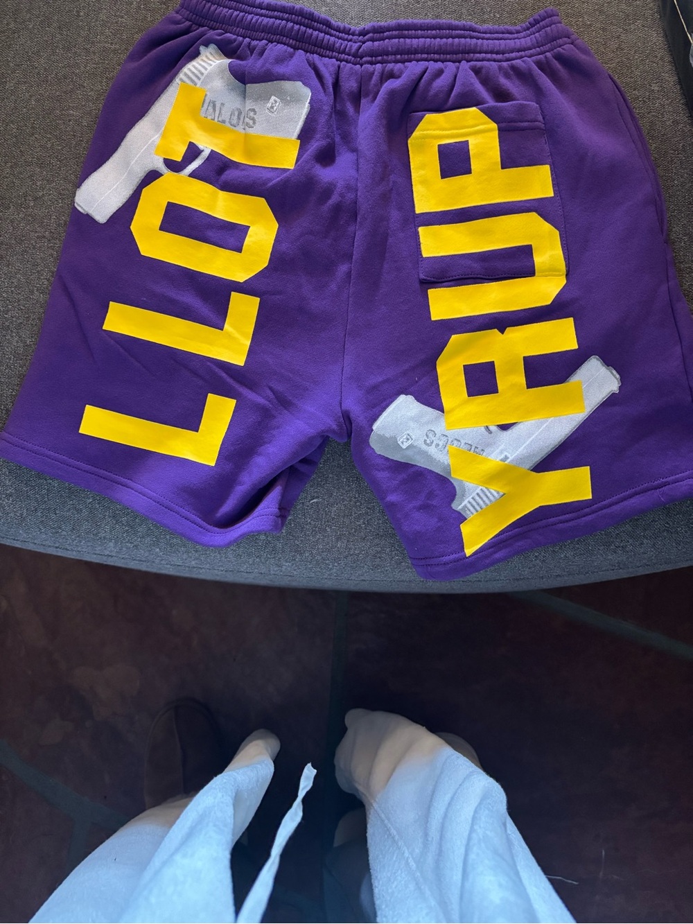 Purple Athletic Shorts with Yellow Graphic Lettering